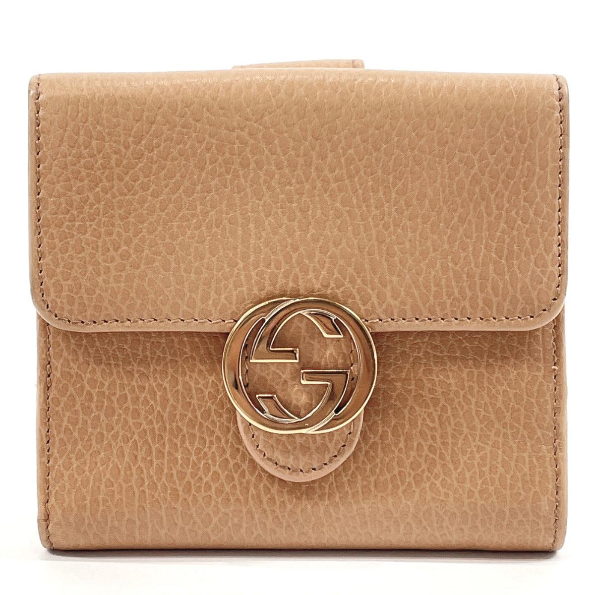 Gucci interlocking dollar camelia long wallet