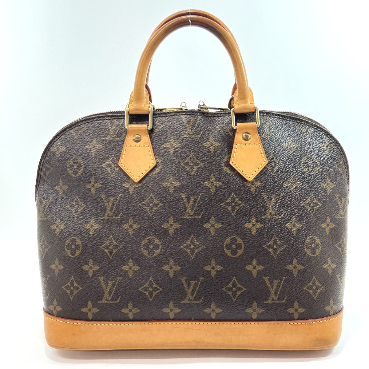 Louis Vuitton case in brown monogram canvas and saffiano blue interior in  good second-hand condition