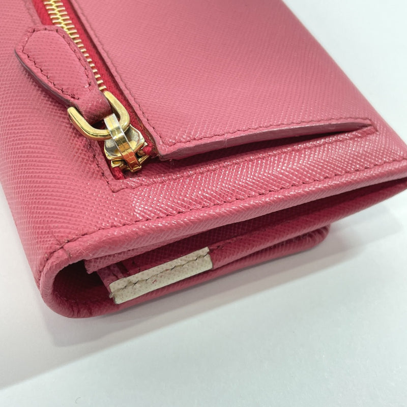 Prada purse with coin compartment, Women's Fashion, Bags & Wallets, Purses  & Pouches on Carousell