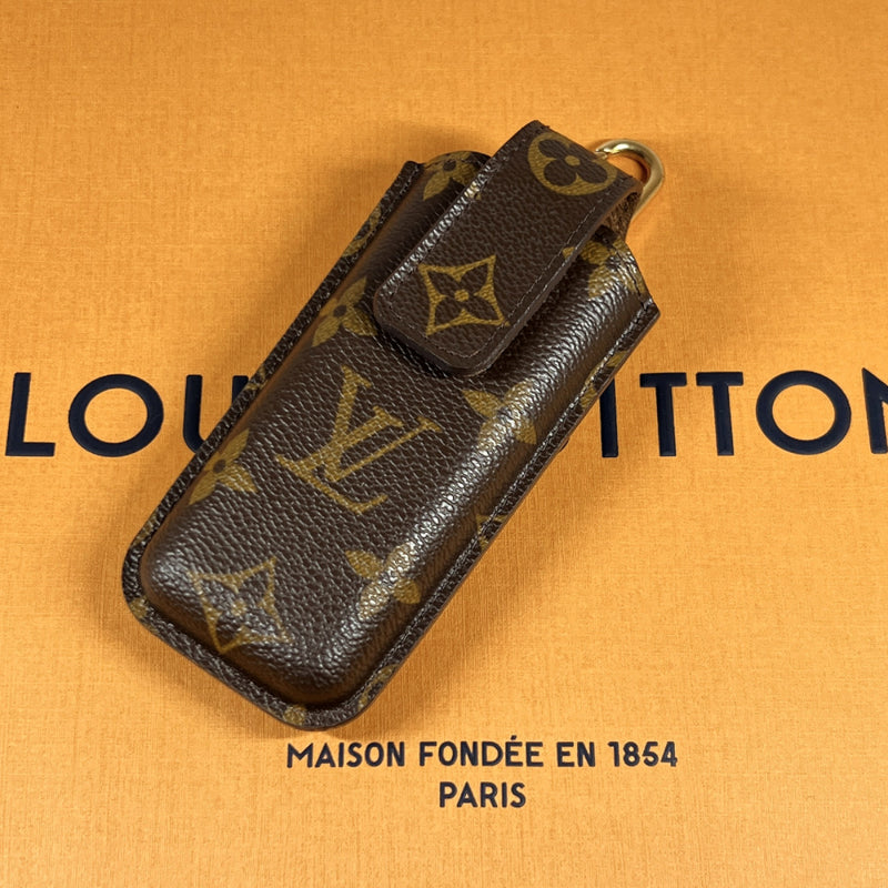Vintage watch case with monogram pattern by Louis Vuitton, France