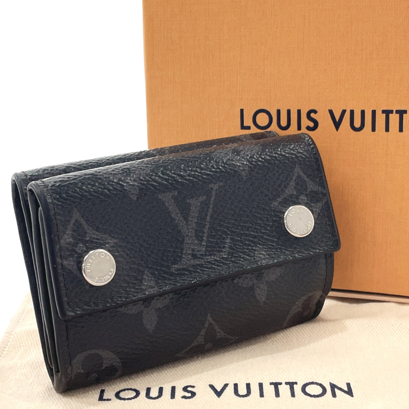 Shop Louis Vuitton Discovery Monogram Canvas Leather Folding