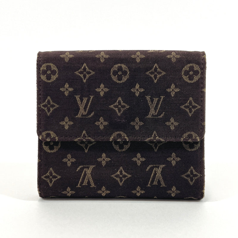 white and brown louis vuittons wallet