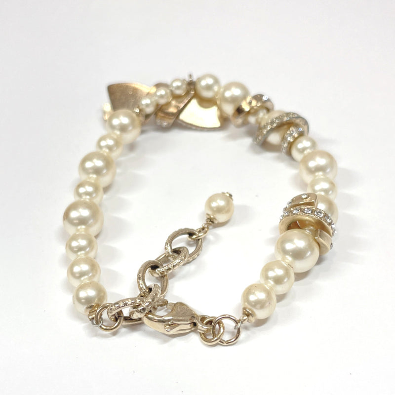 RARE! Louis Vuitton V Motif Gold Pearl Bracelet  Pearl bracelet, Gold pearl  bracelet, Louis vuitton