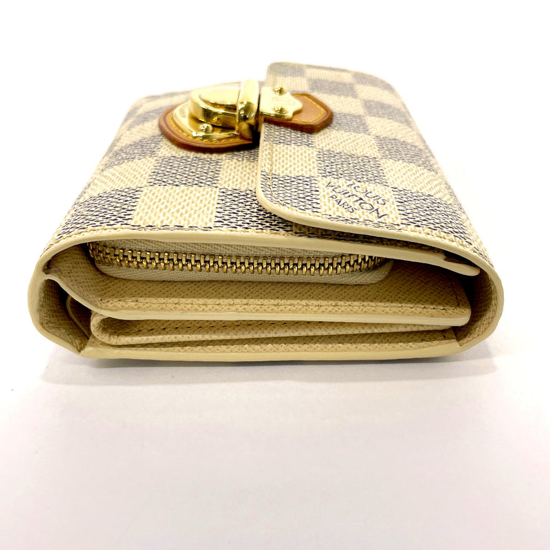 white and gold louis vuittons wallet