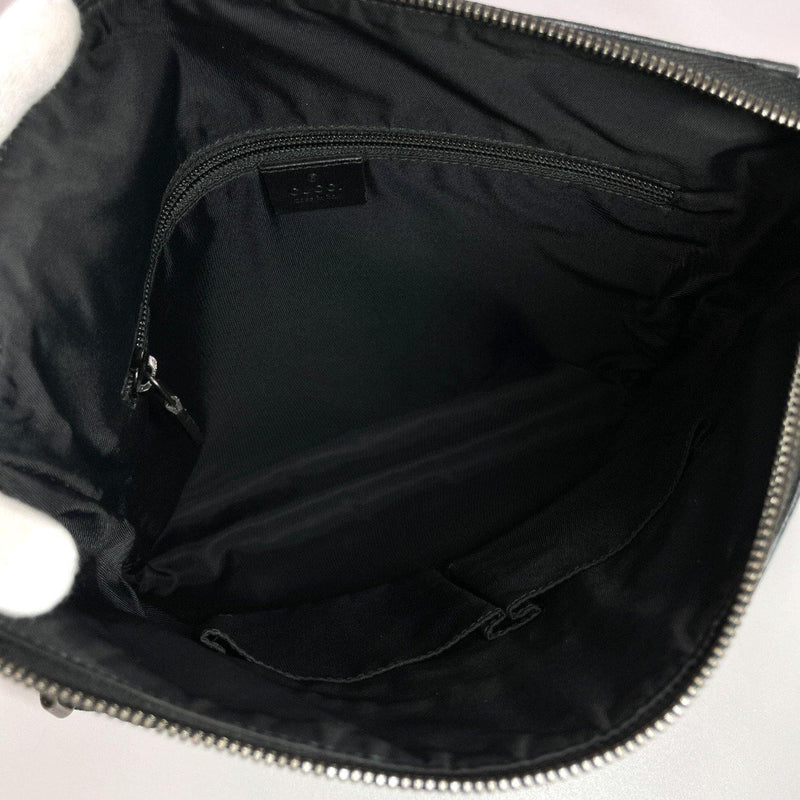Sold Used Gucci Messenger Bag in black leather for men.