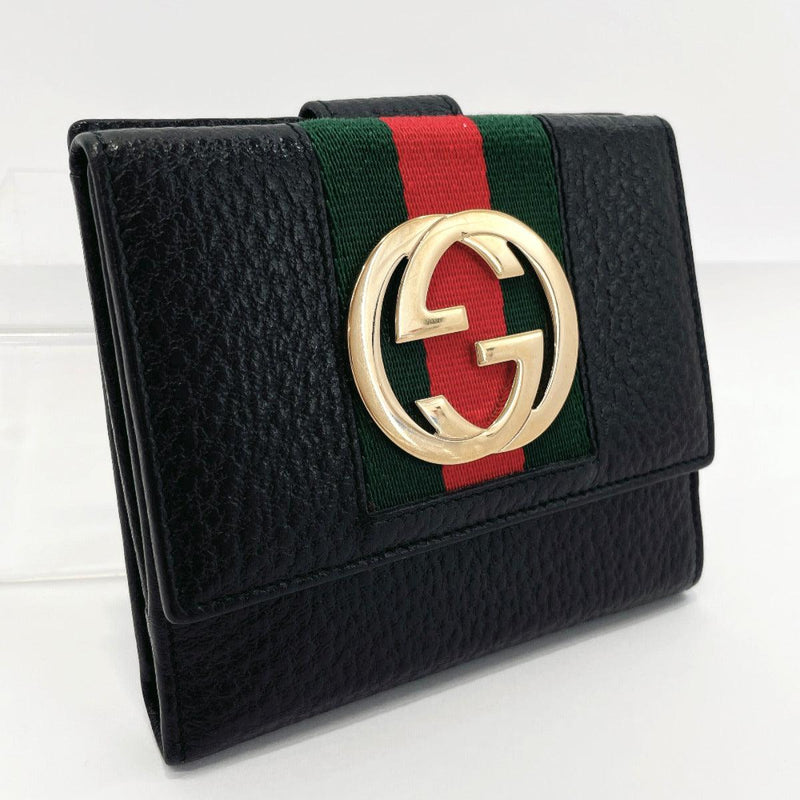 Gucci Inerlocking GG Leather Key Case in Black –