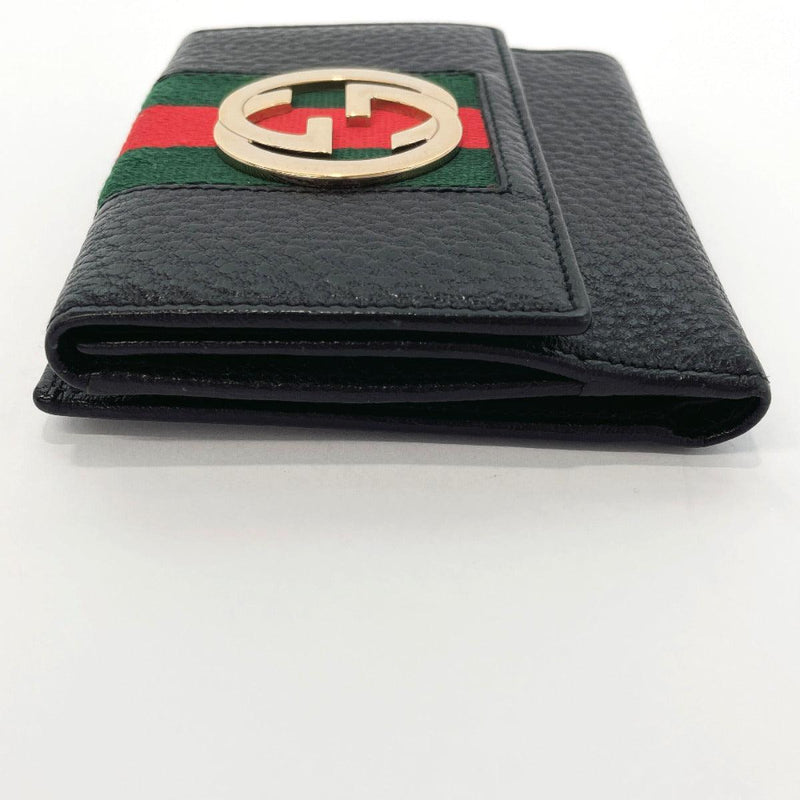 Folding wallet with G detail