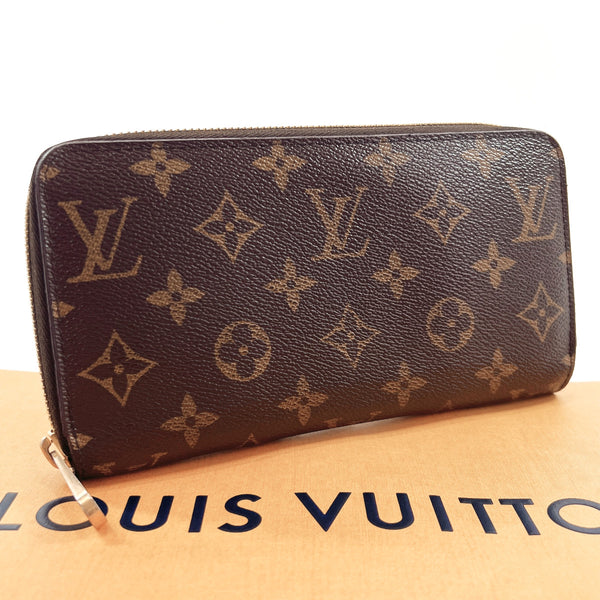 LOUIS VUITTON purse M42616 Zippy wallet Monogram canvas Brown unisex Used