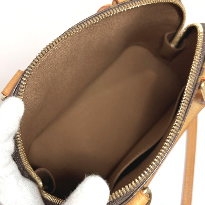 Cite cloth handbag Louis Vuitton Brown in Cloth - 36661525