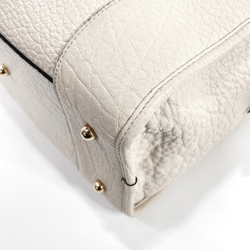 Shop LOUIS VUITTON Women's Leather Handbag - Off White