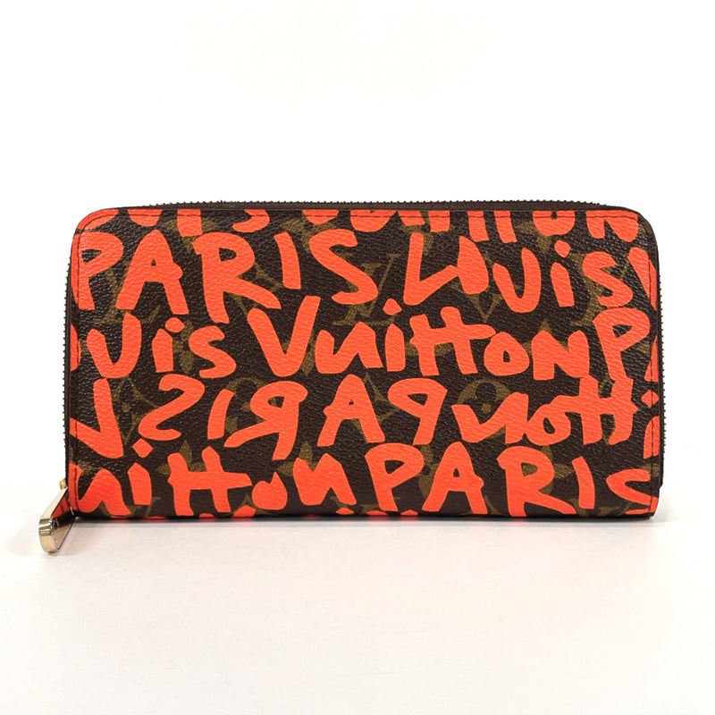 Used Louis Vuitton orange & brown monogram KEYCHAIN